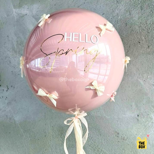 Globo Burbuja Rosa con Letras Doradas y Moños Elegantes